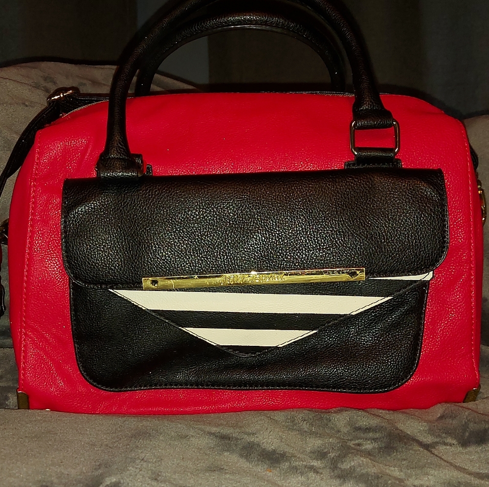 Betsey johnson, red and black shoulder/ hand bag. Good condition. Medium size